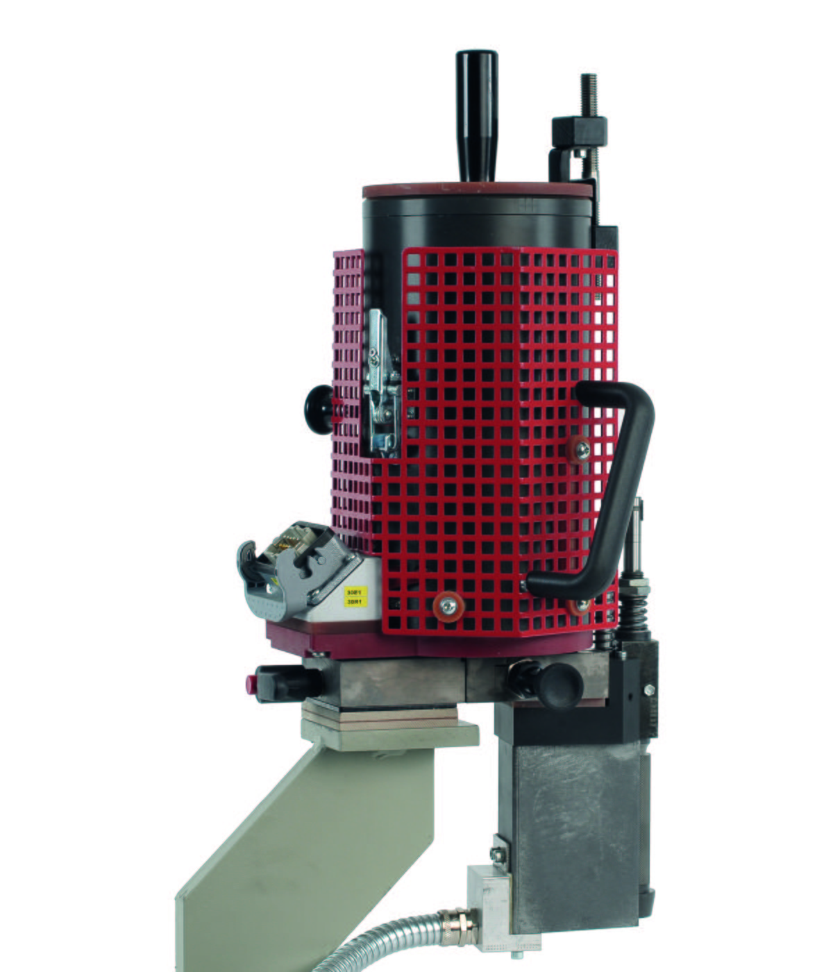 Ott CombiMelt glue tank assembly showing the patented top-driven heated container with safety guard and trim feed